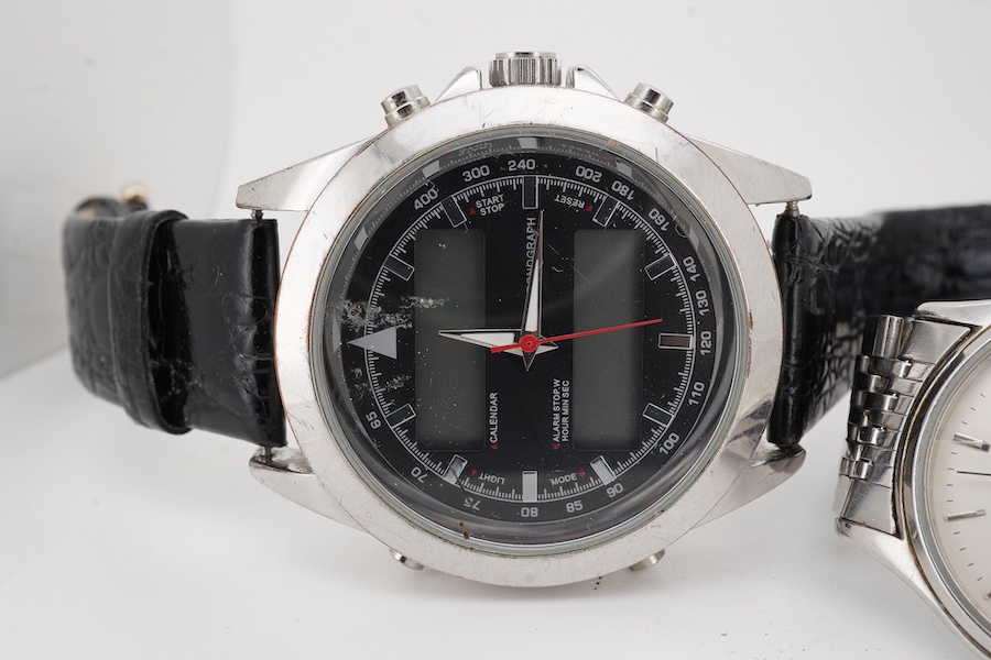 A gentleman's 1980's stainless steel Omega Seamaster quartz wrist watch, with baton numerals and date aperture, case diameter 33mm, (glass cracked), on a stainless steel Omega bracelet, no box or papers, together with on
